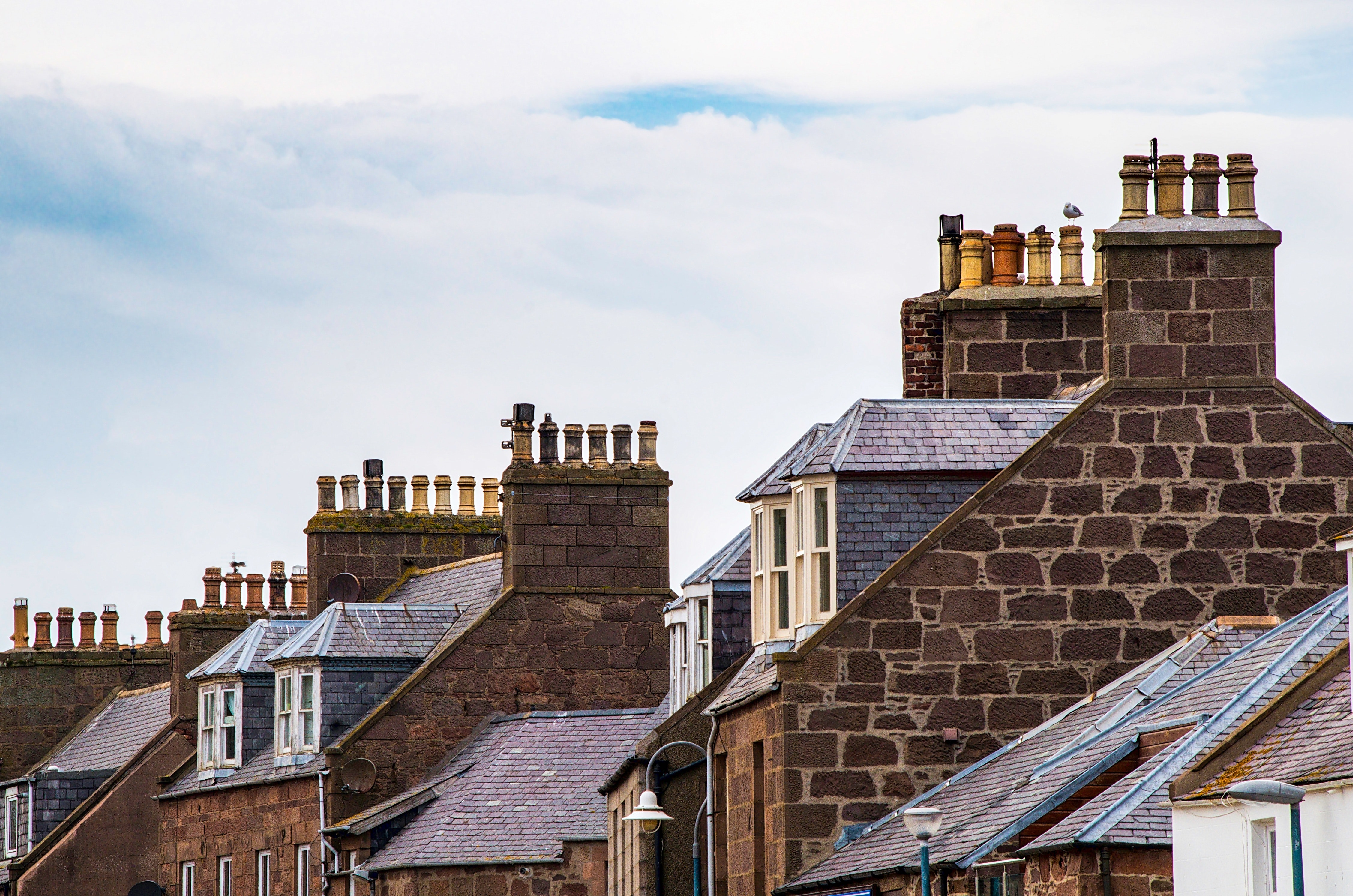 Row of houses with chimneys in Devon location