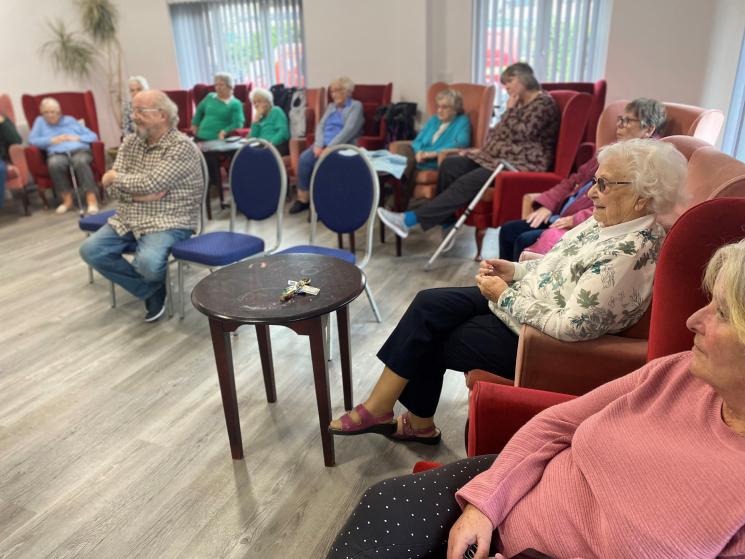 Residents in Bideford listen to a safety talk from our experts